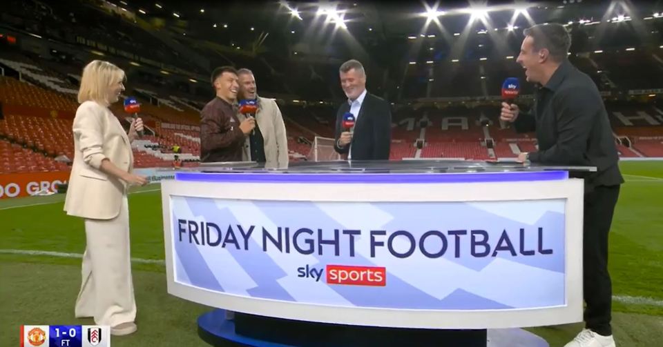 a group of people standing in front of a sign that says friday night football