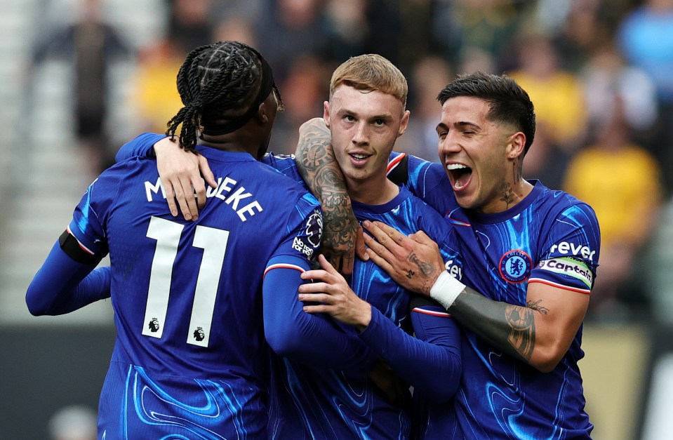 Madueke with his Chelsea teammates Cole Palmer and Enzo Fernandez