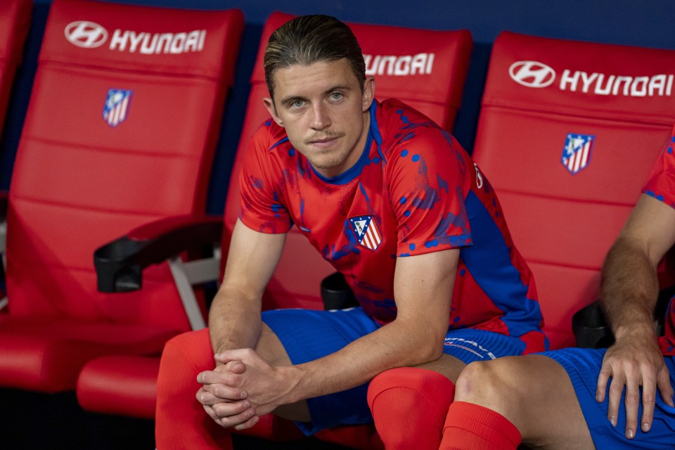 a soccer player sits in a hyundai chair