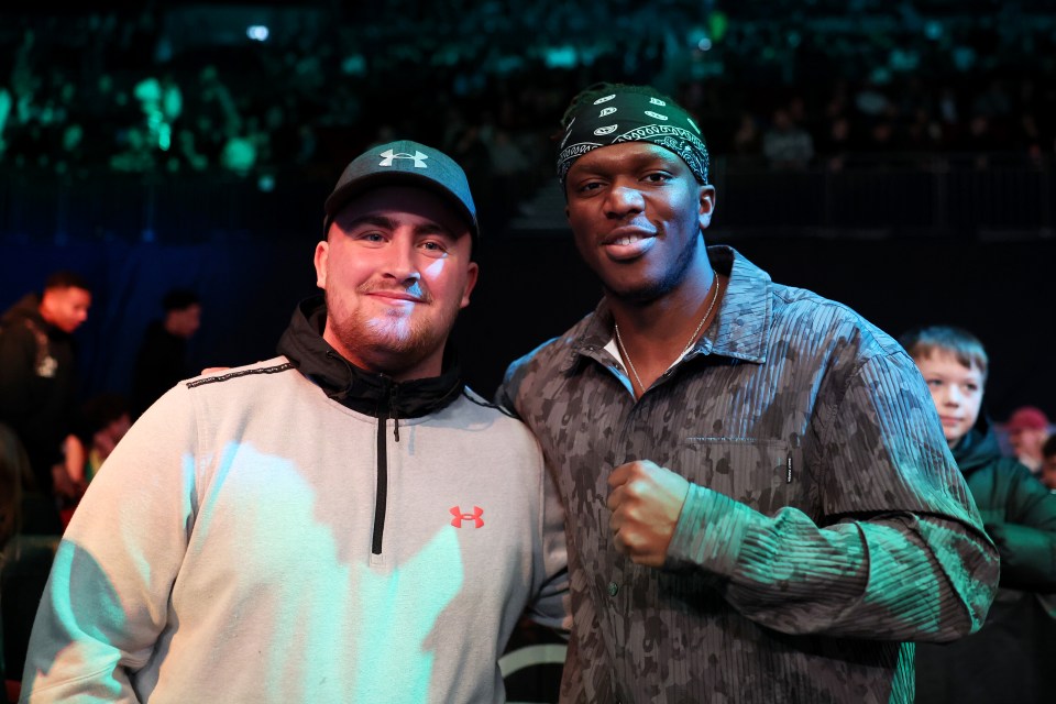 Littler and KSI pose at a DAZN boxing event