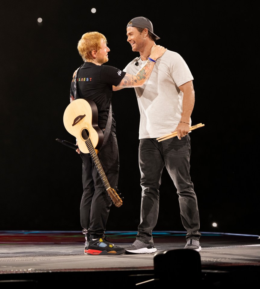 Ed Sheeran and Chris Hemsworth on stage together