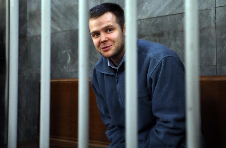 Smug kidnapper Lucasz Herba grins in the dock