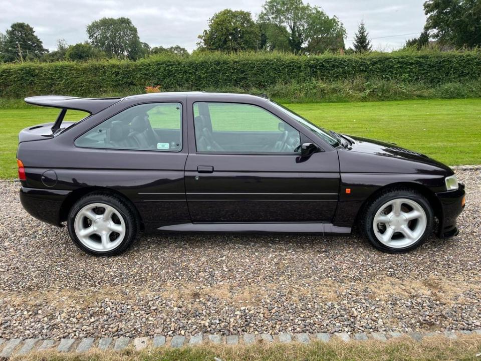 Inside the motor is an original cassette player and pristine black leather seats