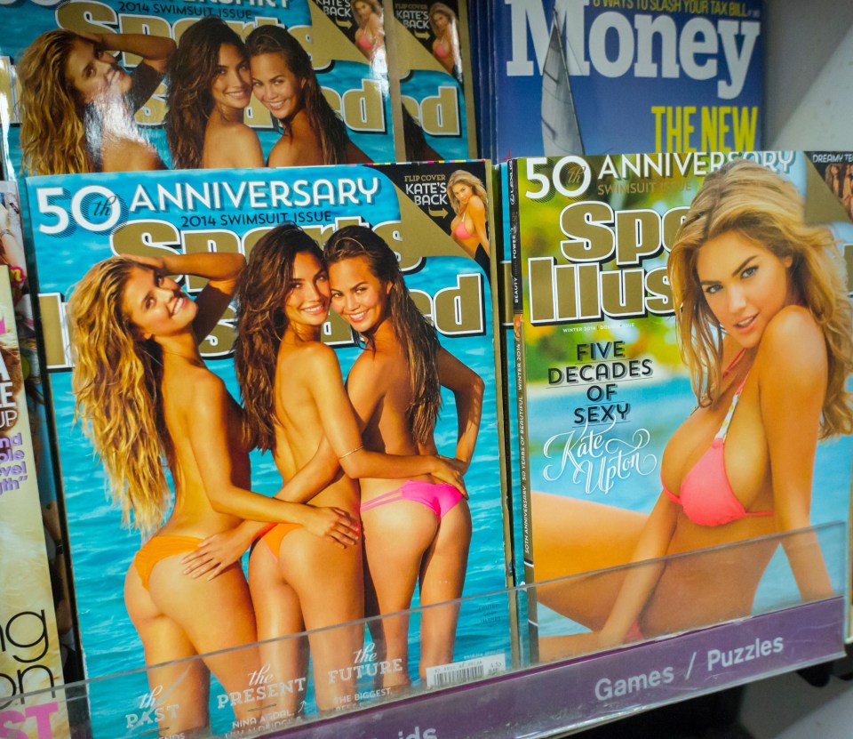 a display of magazines including sports illustrated and money