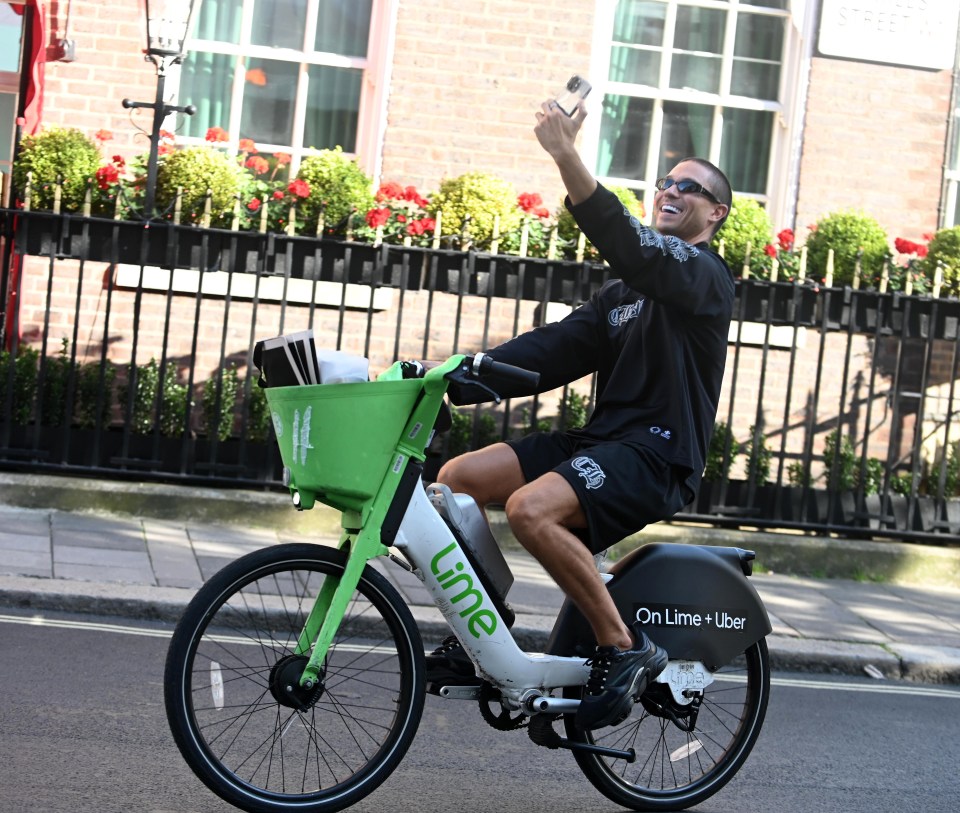 Joey was mobbed by fans as he rode a bike through London