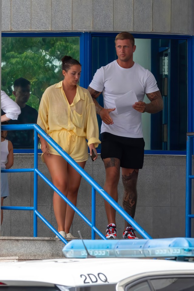 The pair showed off their incredible tans