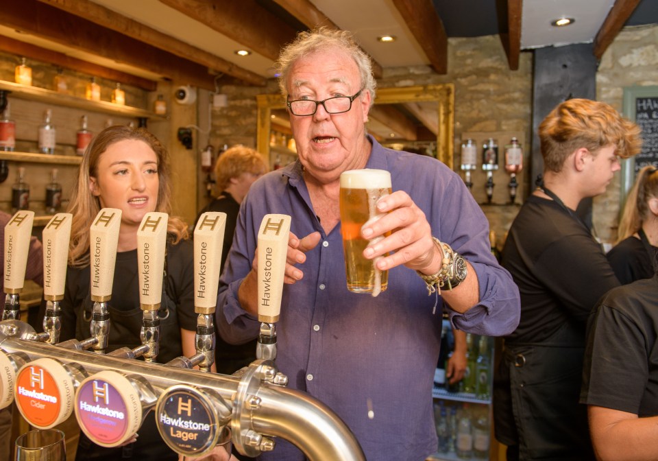 The TV star pictured pulling pints