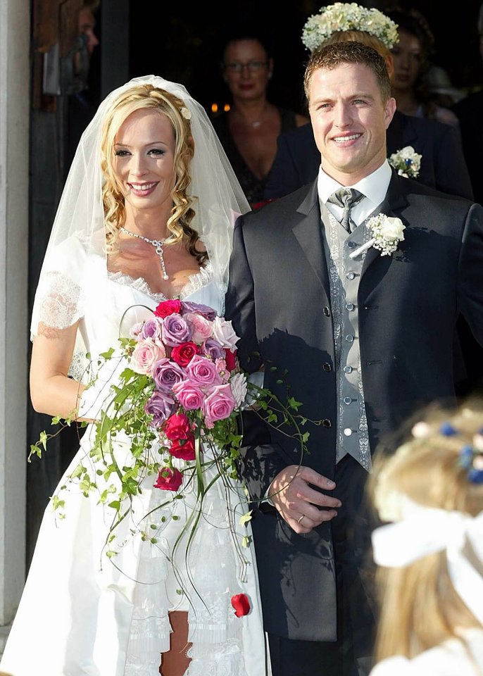 Formula 1 driver Ralf Schumacher and his wife Cora, leave the church after a wedding ceremony in Maria Plein near Salzburg, Austria in 2002