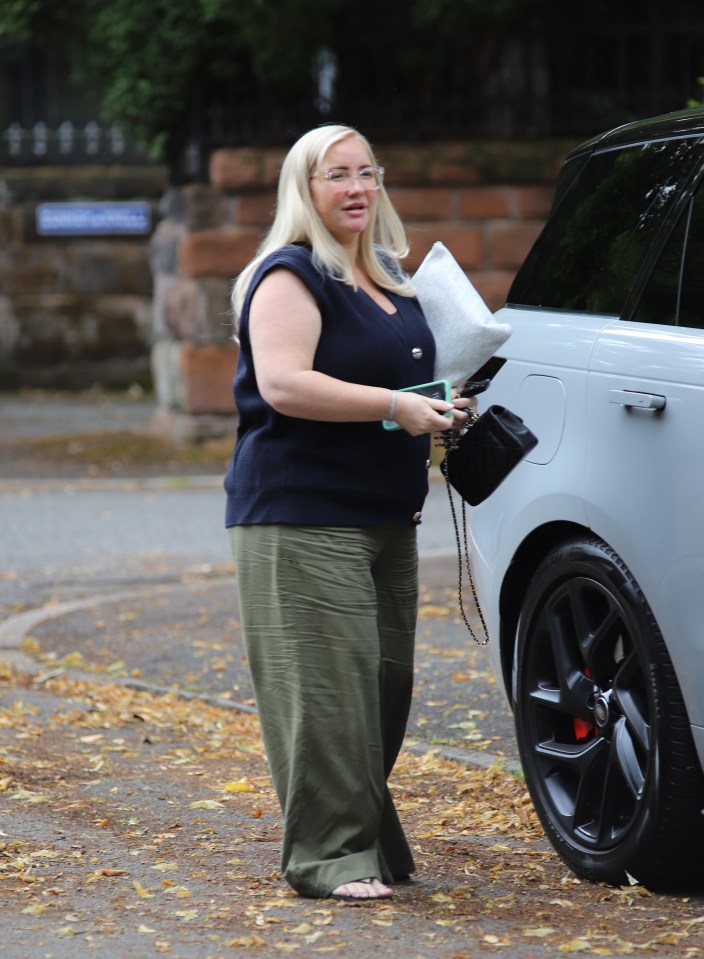 Molly's manager Fran Britton arrived at her house