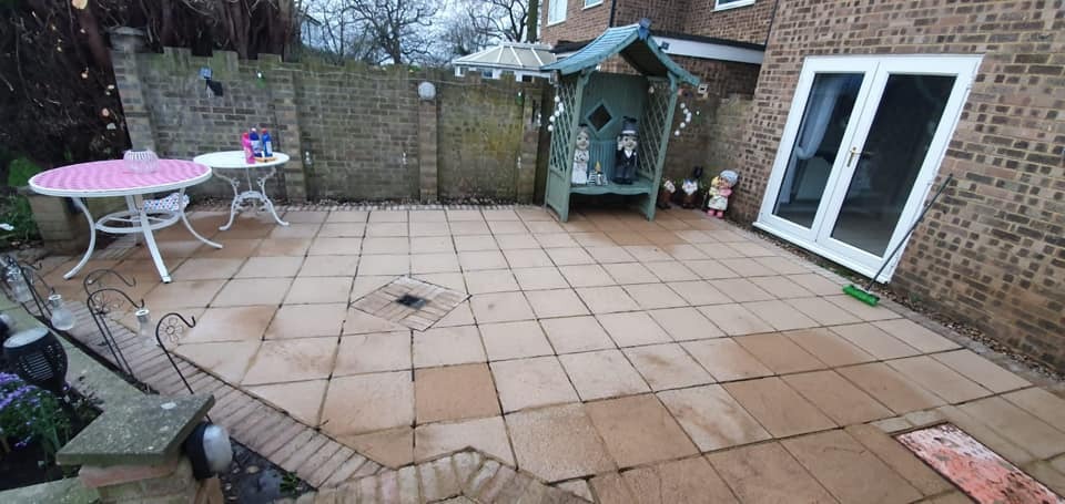 She explained that she used three bottles of Elbow Grease, a brush, and a jet washer to transform her patio