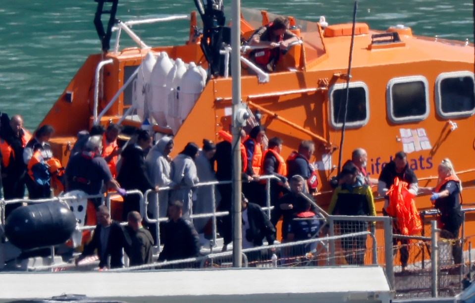 Migrants head for UK shores after being rescued from a deflated dinghy on Wednesday - making up some of the 614 who arrived that day