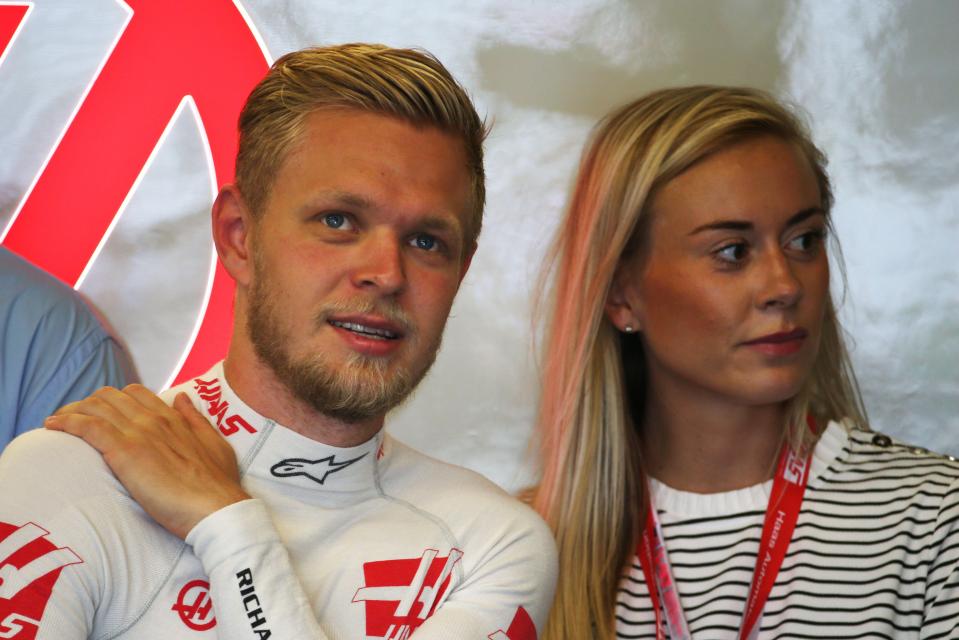 Magnussen, with his wife Louise Gjorup, was fired by email