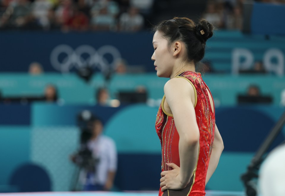 Chinese gymnast Hu Yicheng fell during her routine, securing gold for Page