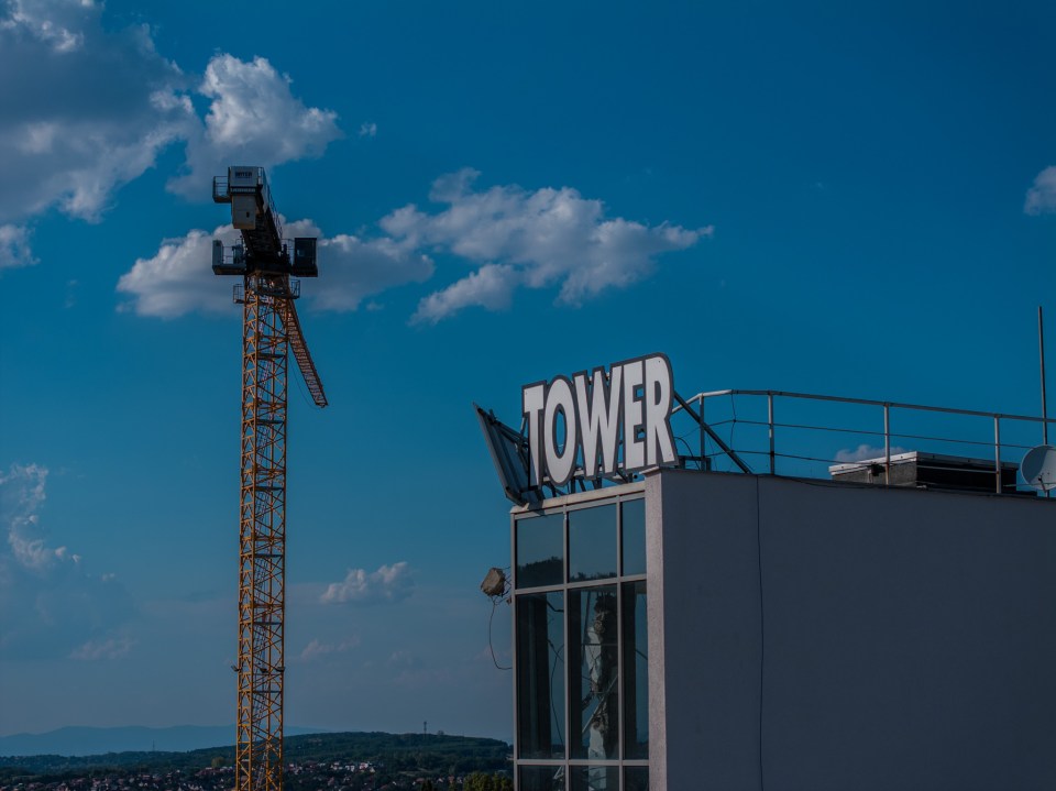 the word tower is on the side of a building