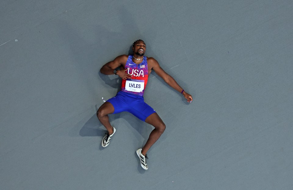 Lyles lay on the track for some time after the race