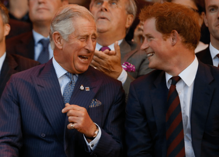 Charles and Harry laugh during the opening ceremony of the Invictus Games at the Queen Elizabeth Park on September 10, 2014