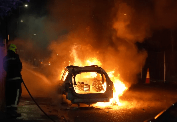 A cop car was set alight amid riots in Hartlepool this week