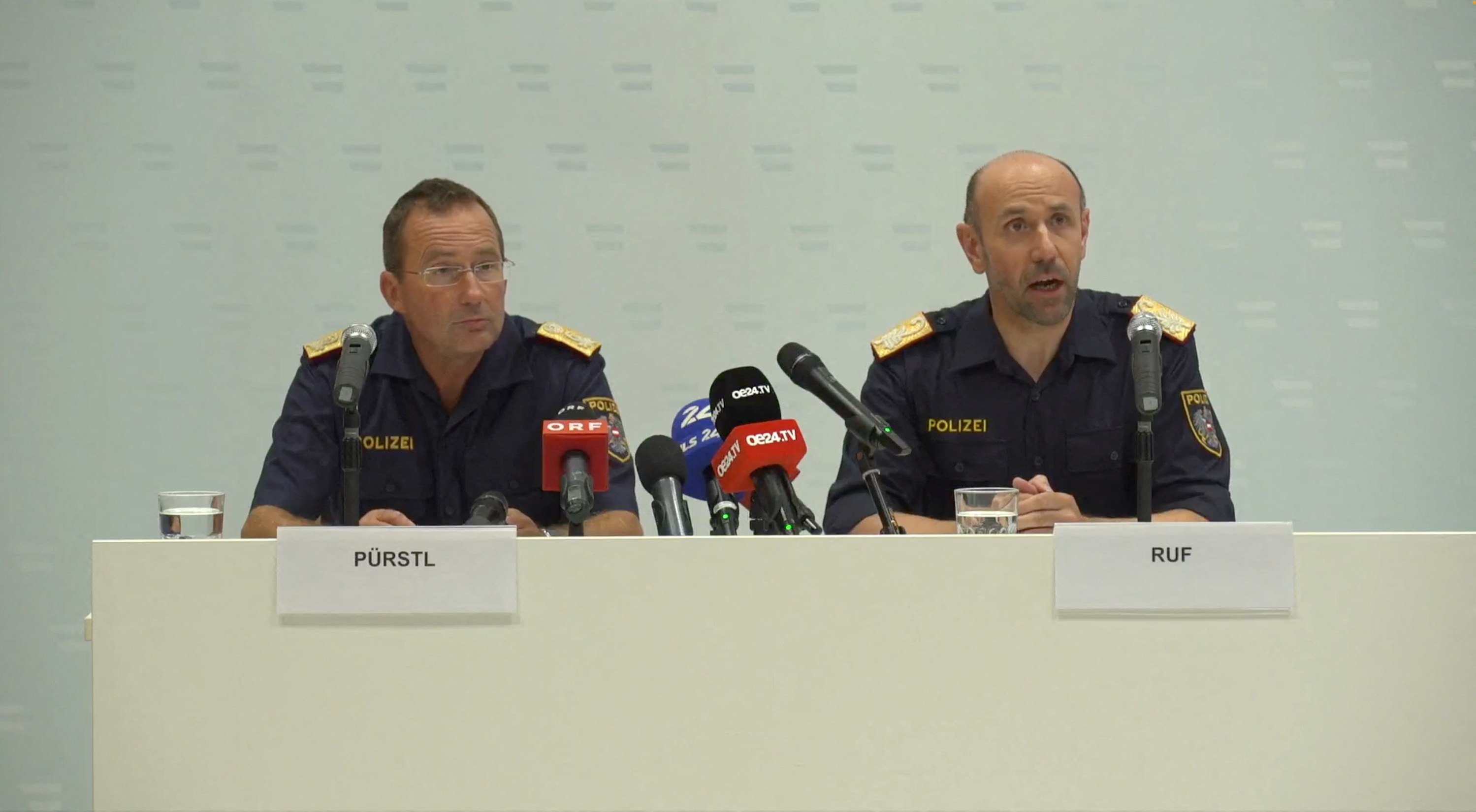 Austrian official Franz Ruf and Vienna cop chief Gerhard Puerstl hold a press conference about the arrests