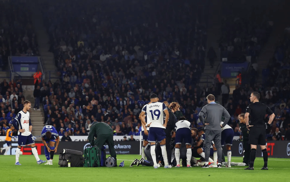 Medics rushed on to treat the stricken midfielder