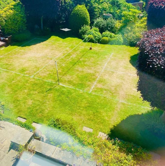 The couple recently created a badminton court in their garden