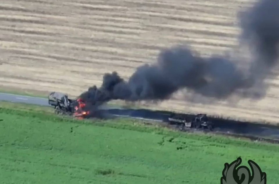 Daylight drone footage showed the trucks burning