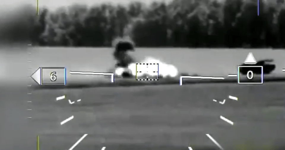 a black and white photo of a plane with the number 6 on the left