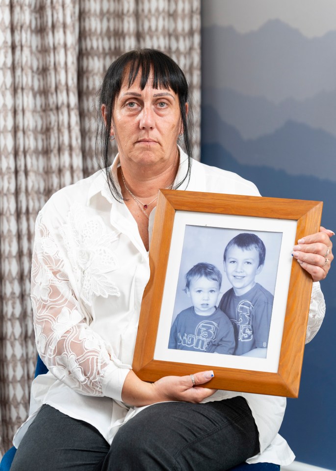 Jay Slater's heartbroken mum Debbie Duncan, holding a photo of Jay and brother Zak, told of their 'special bond'