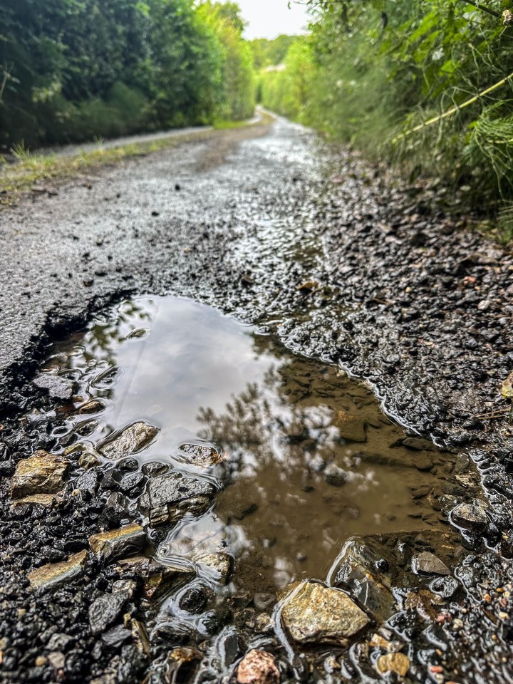 The leak means a constant stream of water runs down the lane