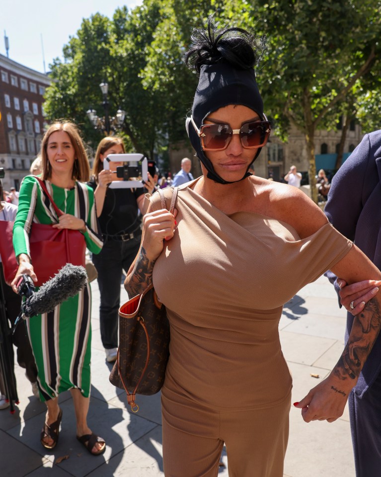 Former glamour model Katie Price arriving at the Royal Courts of Justice in central London