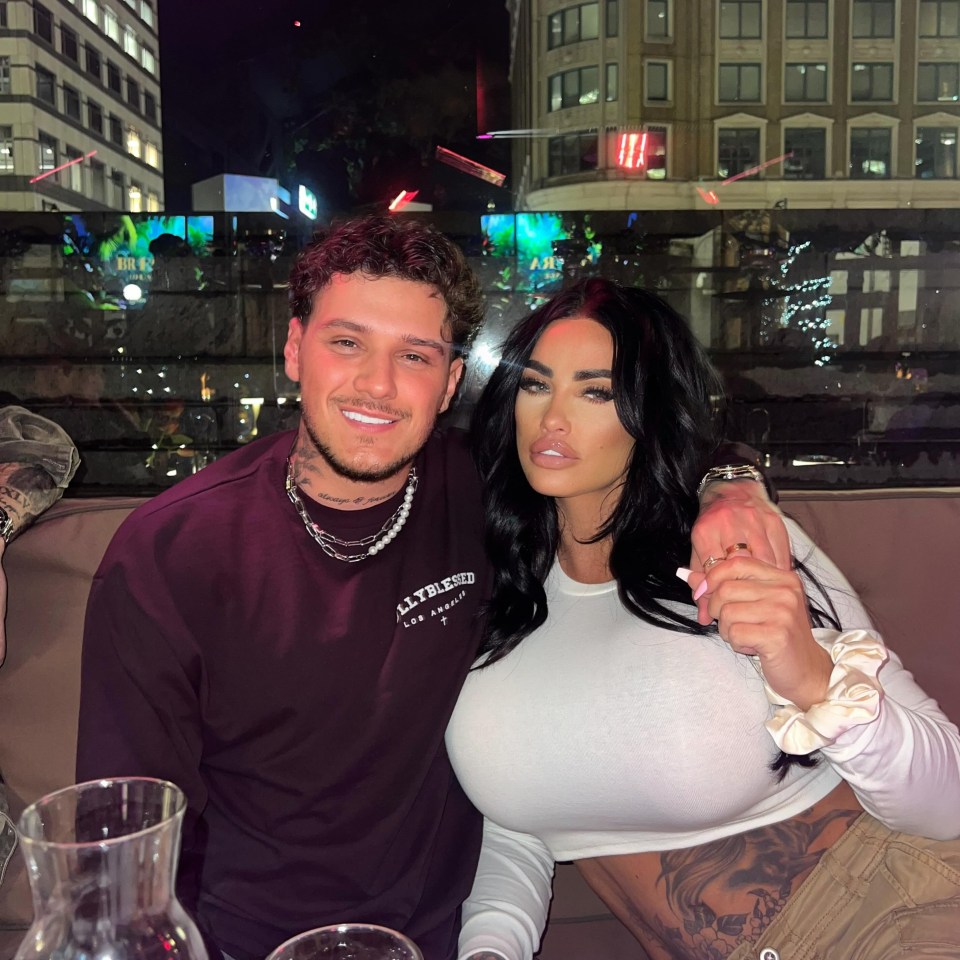 a man wearing a shirt that says all friends is posing with a woman