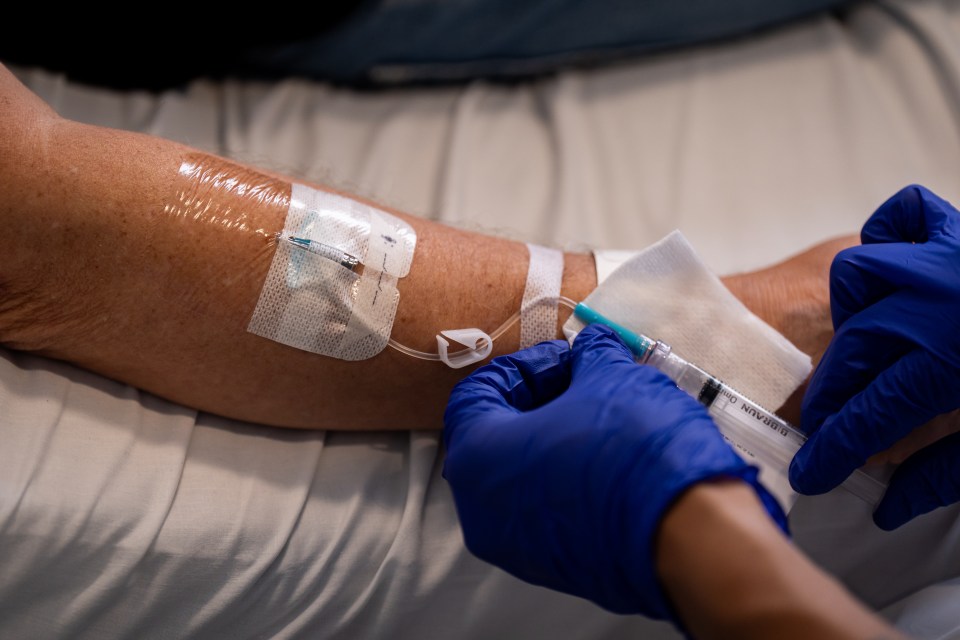 a person is getting an injection from a syringe that says novacure