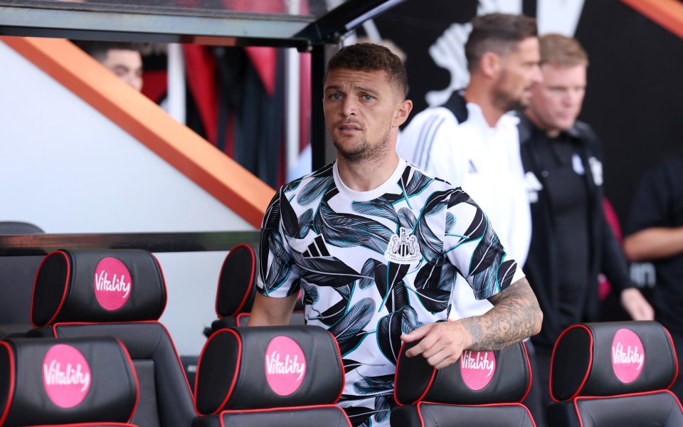 a man wearing a shirt that says newcastle on it