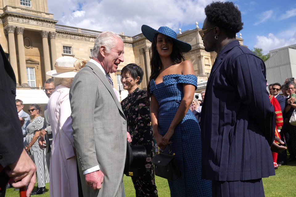 The King with Maya Jama, at a Buckingham Palace party