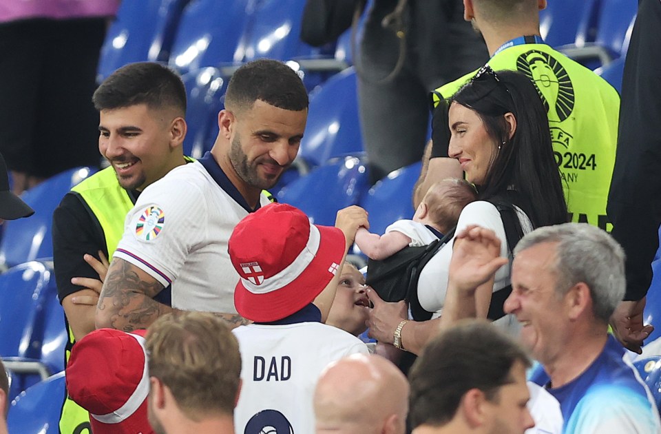 Annie and their sons support Kyle at the Euros in Germany from the stands