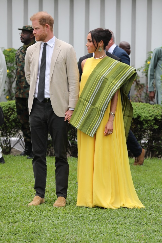 Harry and Meghan Markle during their visit to Nigeria in May