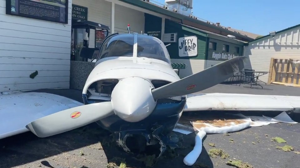 The aftermath of an emergency crash landing at a California golf complex