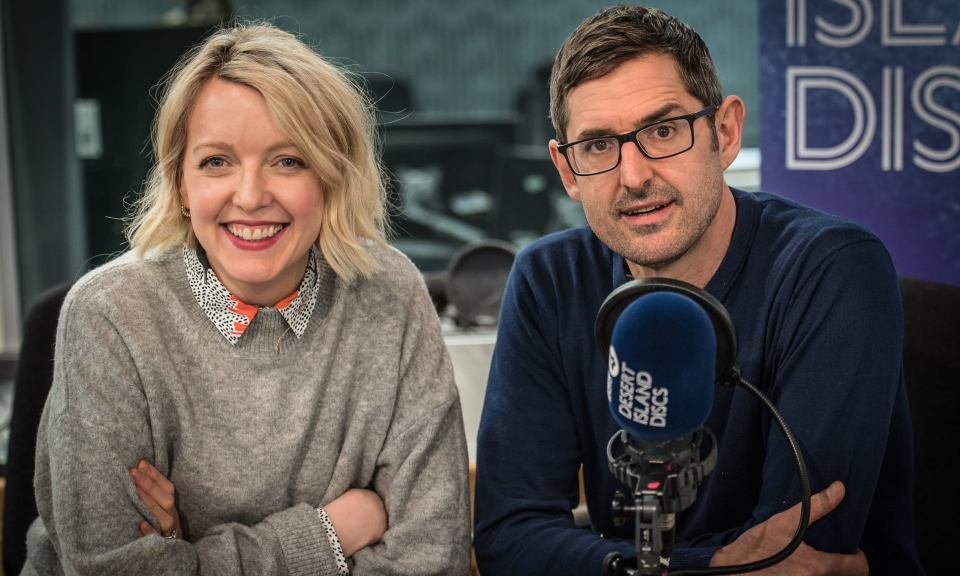 a man and a woman are sitting in front of a microphone that says dorset island radio