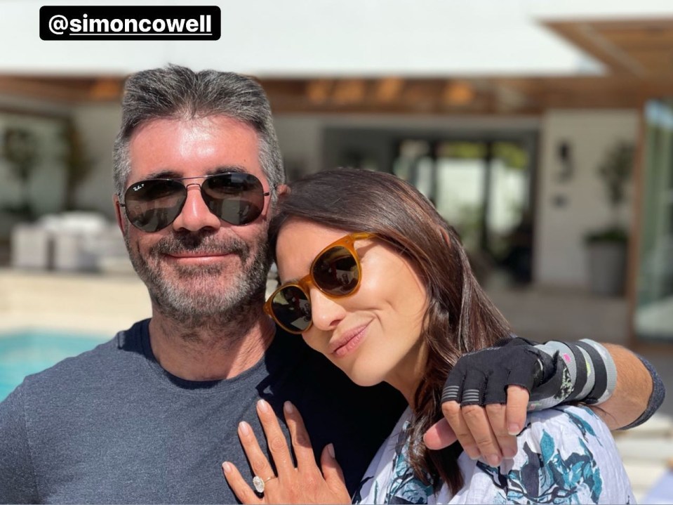 a man and woman posing for a picture with the caption @simoncowell