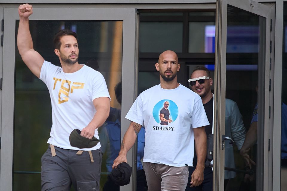 Brothers Tristan (L) and Andrew Tate leaving court on Thursday