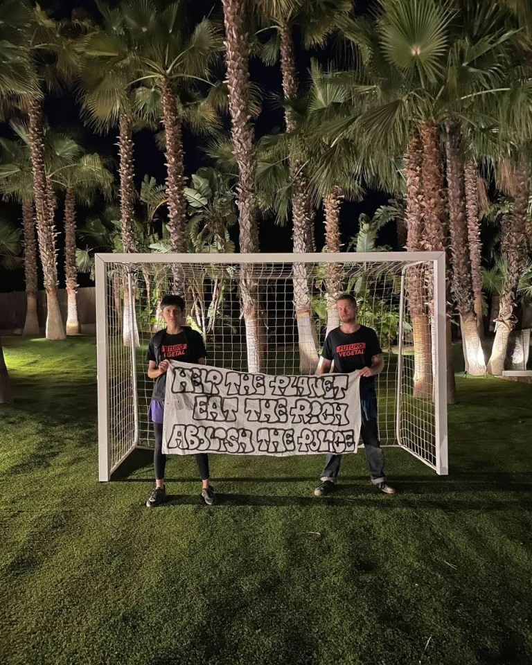 The vandals posed in front of a goal in Messi's garden