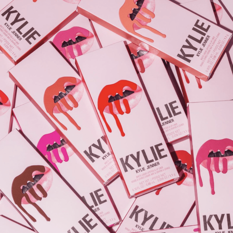 several boxes of kylie jenner makeup are stacked on top of each other