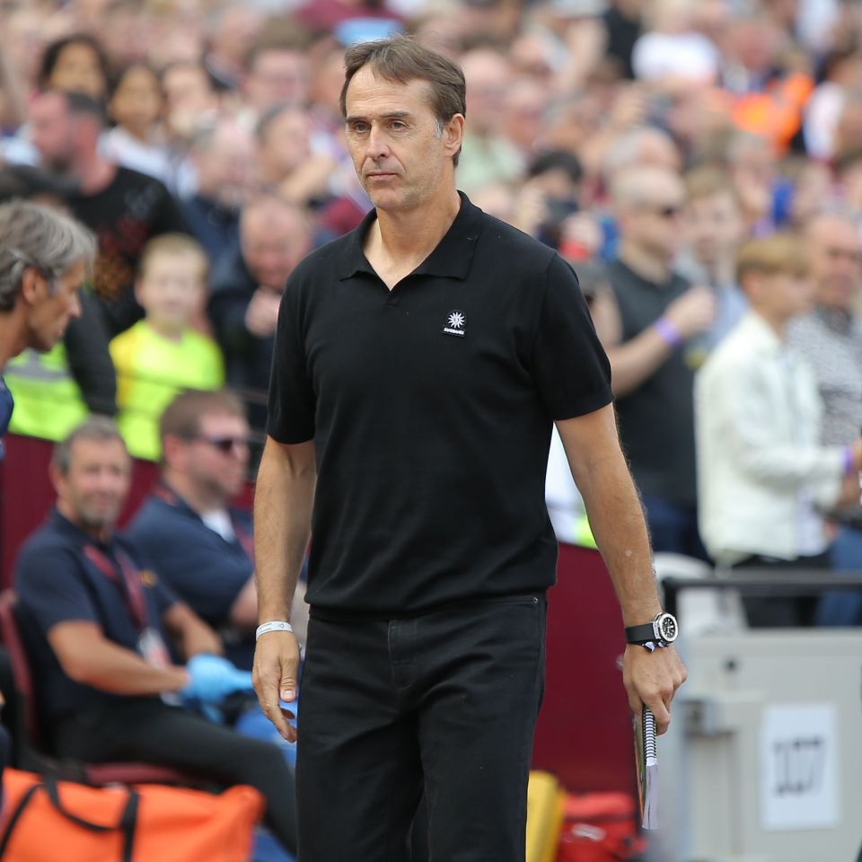 a man wearing a black shirt with the word reebok on it