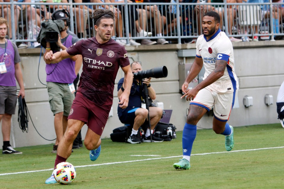 Reece James battles with Jack Grealish