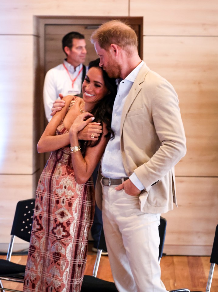 The couple put on a loved-up display on their first day of the trip