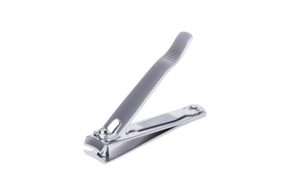 a nail clipper with a gray handle on a white background