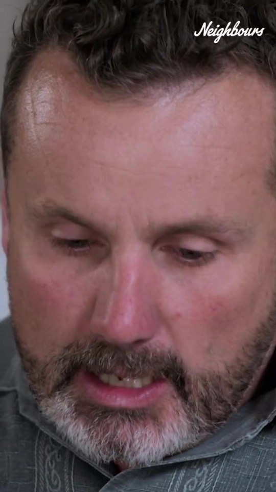 a close up of a man 's face with the words neighbours on the bottom