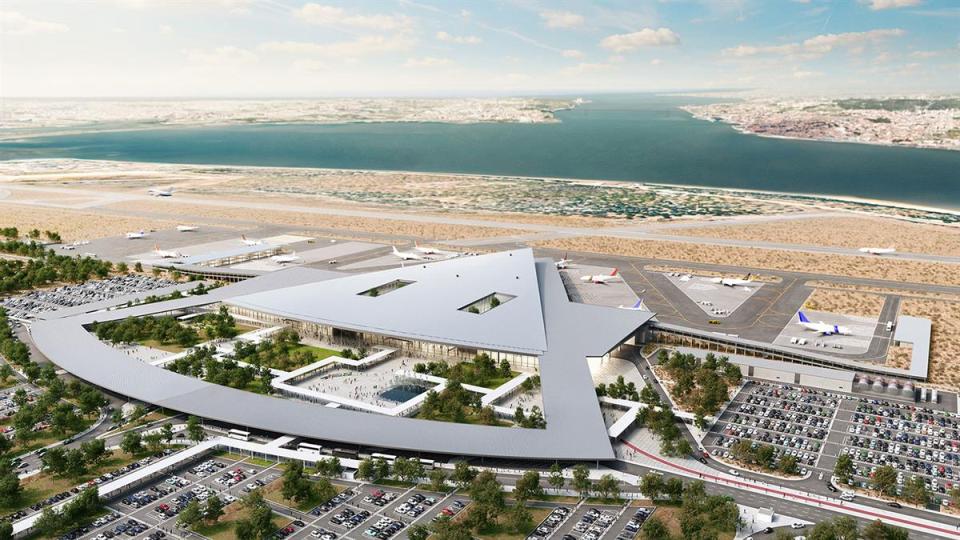 an aerial view of an airport with planes on the runways