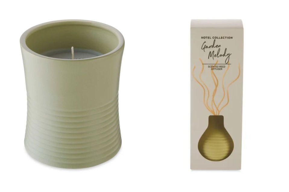 a candle next to a box that says hotel collection garden melody