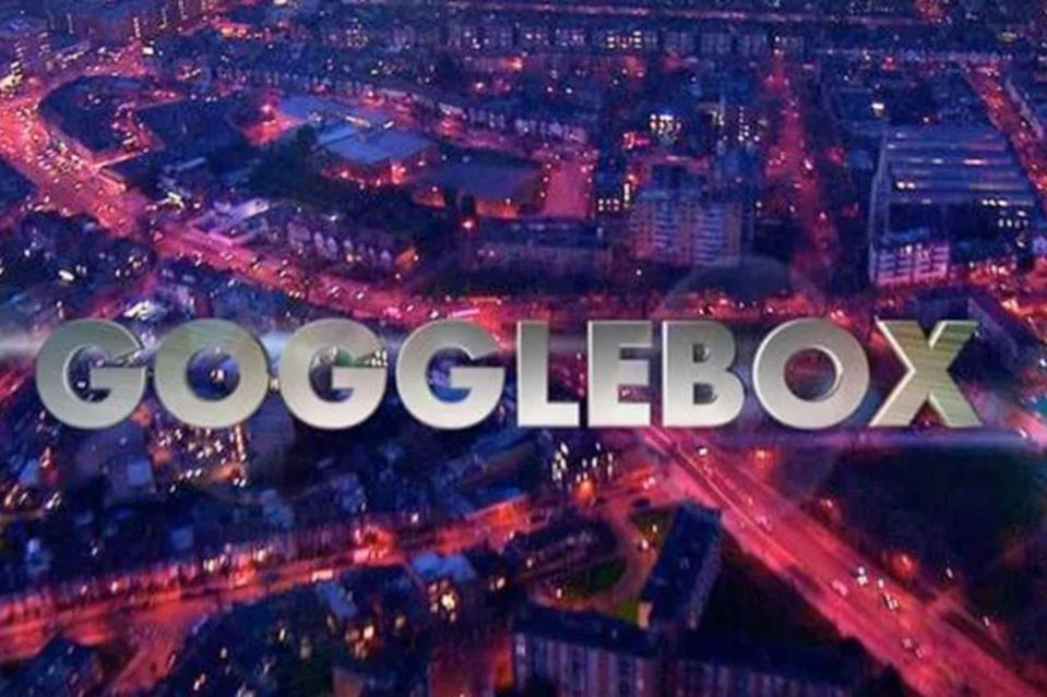 an aerial view of a city at night with the words gogglebox in the foreground