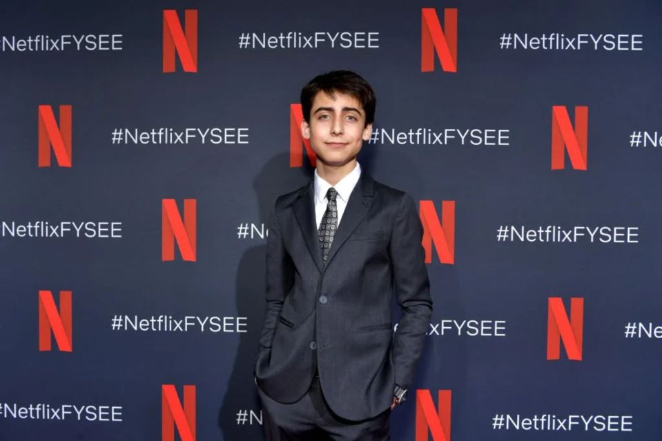 Aidan Gallagher plays a 13 year old with the mind of a man in his fifties